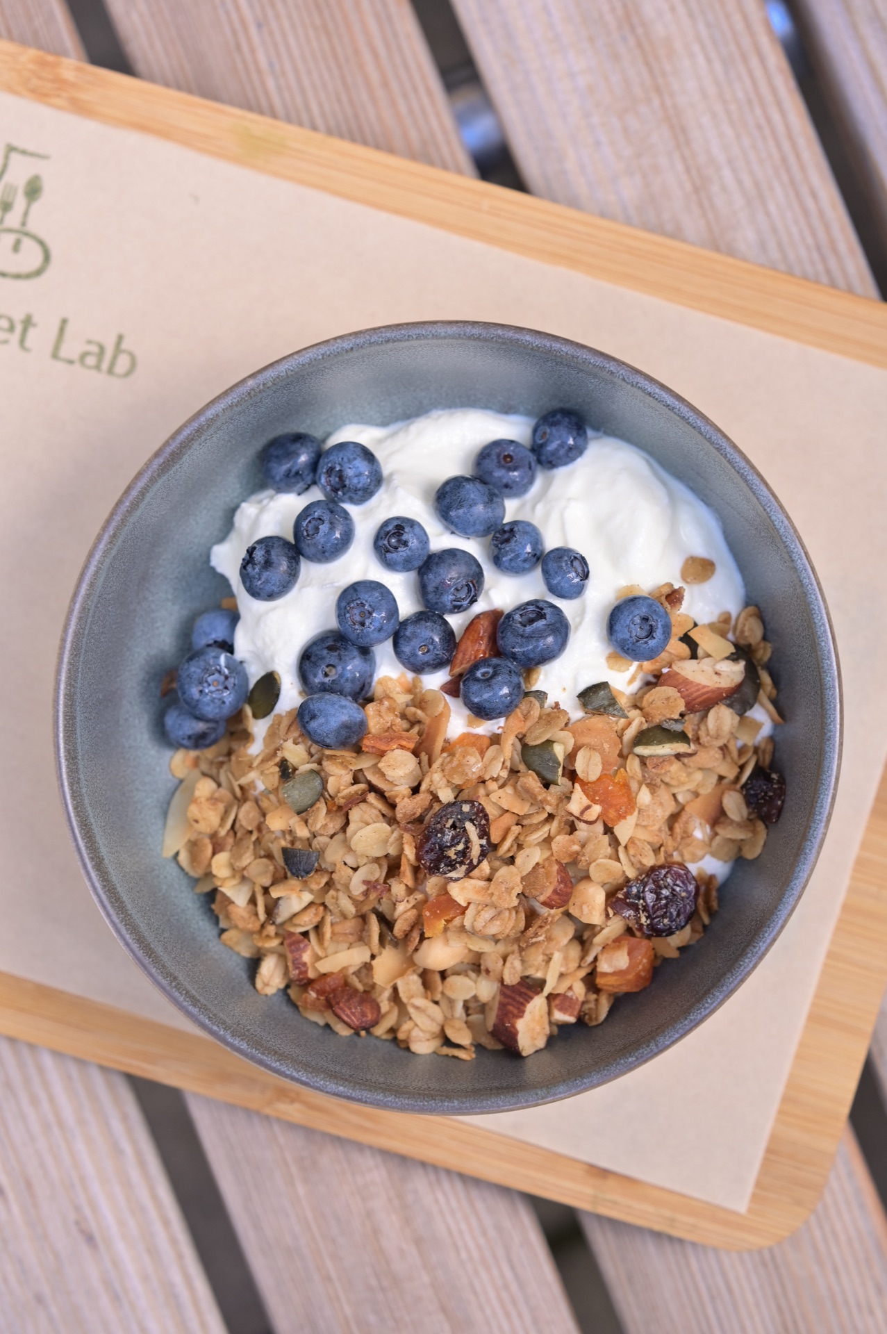 Granola bowl with yogurt and blueberries from above