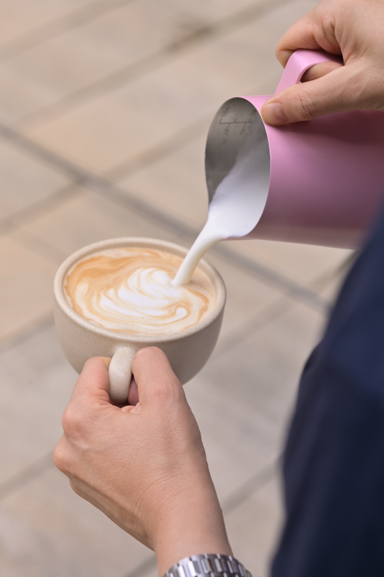 Specialty latte art being poured
